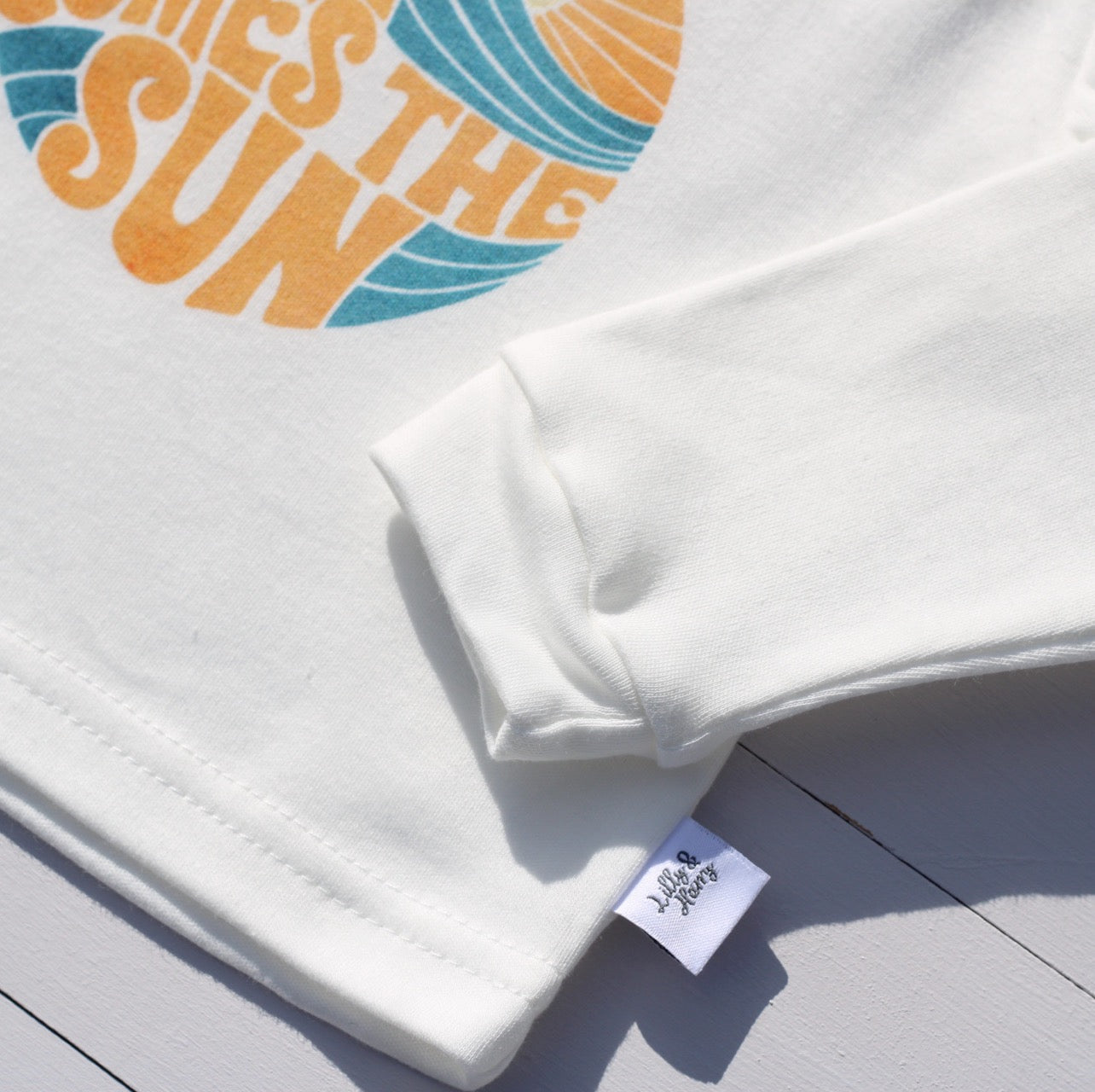 Retro Here Comes The Sun Baby Top With Long Sleeves in White