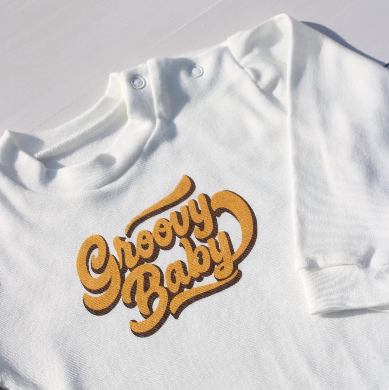 Retro Groovy Baby White 100% Cotton T-shirt with Poppers
