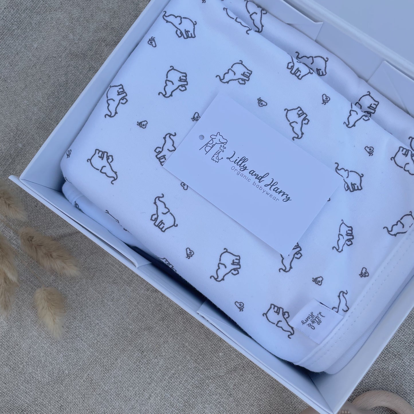 baby shower gift for new and expecting parents. super soft organic cotton blanket with elephant printed design for minimalist and gender neutral
