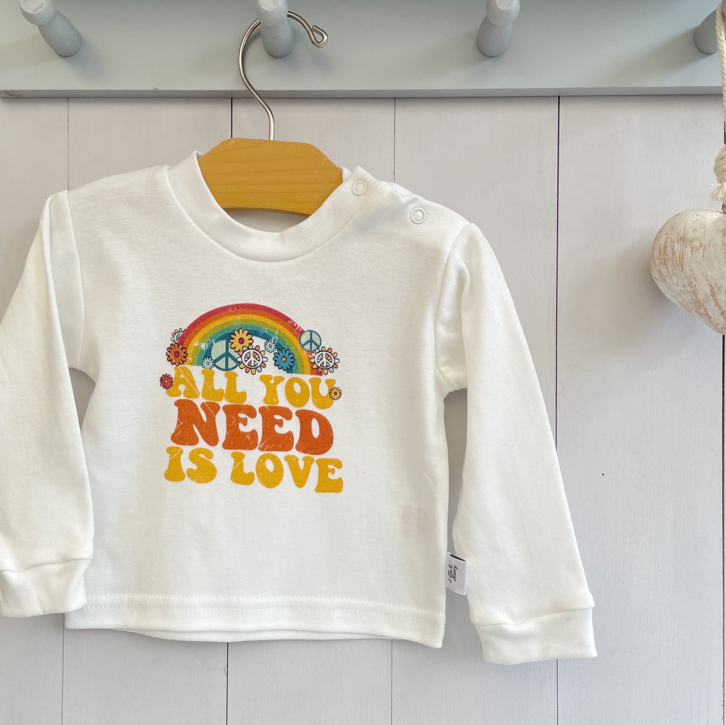 Retro All You Need Is Love Baby Top With Long Sleeves in White