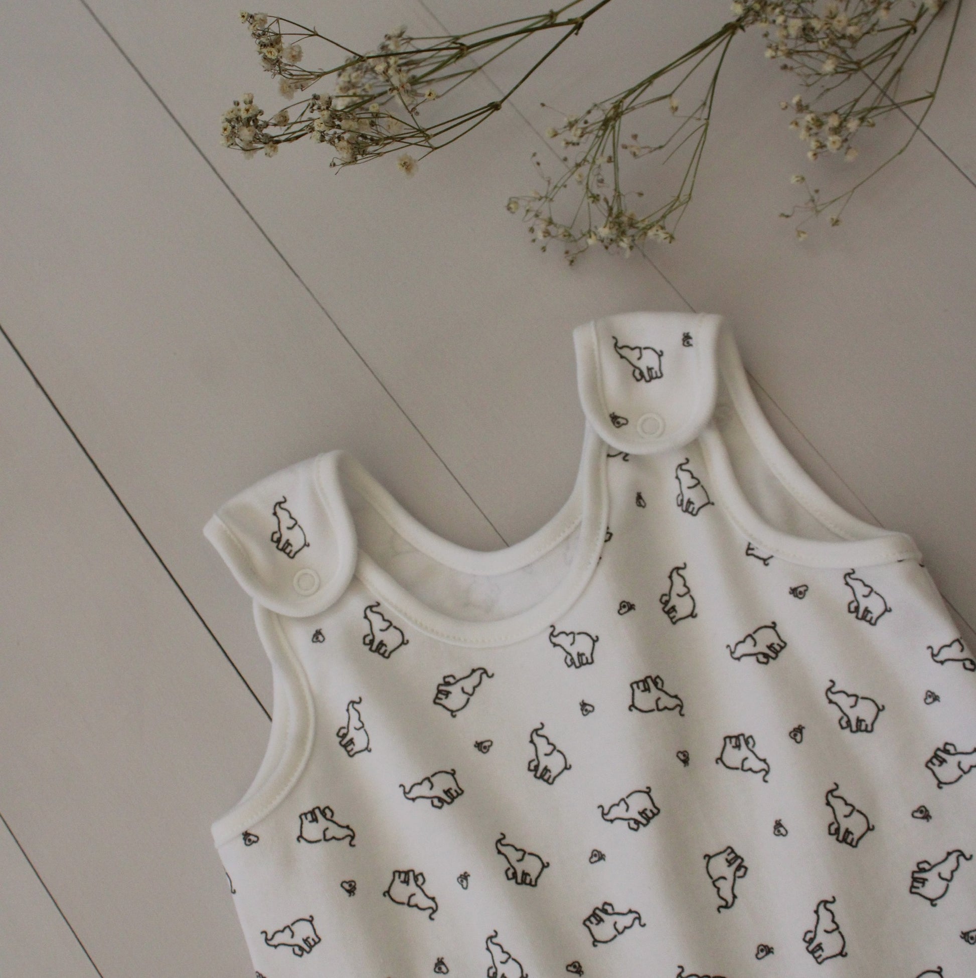 organic cotton elephant baby grow. super soft organic baby grow romper for expecting parents. safari themed baby shower gift